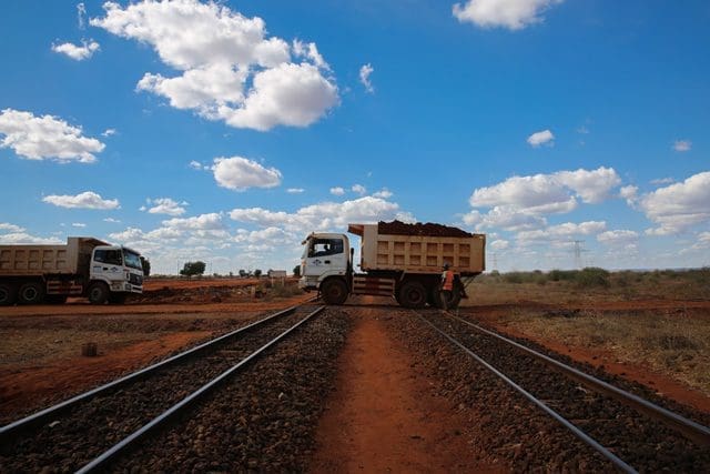 A truck passes a segment of old railway at a construction site on section two of Kenya's Standard Gauge Railway project, near Voi, Kenya, on March 19, 2015. The project, expected to cost 3.8 billion U.S. dollars, involves the construction of about 480 kilometer railway line from the port city Mombasa to the capital city Nairobi. China Roads and Bridges Corporation (CRBC) is undertaking the project. (Xinhua/Pan Siwei)