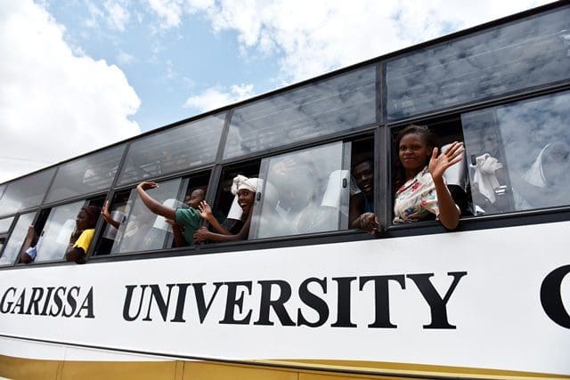 Survivor students prepare to leave for home in Garissa, Kenya, April 4, 2015. A total of 663 survivors from a Kenyan university attack left Garissa town for their homes Saturday. The survivors, including 50 school staff, were aboard 13 bus. They were departing after camping for two days. (Xinhua/Sun Ruibo)