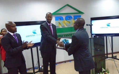 wpid-The-Executive-Director-of-the-Rwanda-Capital-Market-Robert-Mathu-is-handing-over-the-certificate-to-Jack-Kayonga-Chairman-of-Crystal-Telecom.jpg