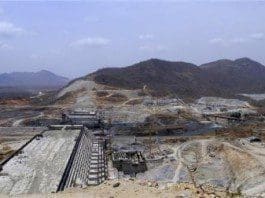Even before the impact studies have been started, officials say 50 percent of the dam's construction has been completed [Reuters]