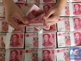 China's central bank injected 55 billion yuan (US$8.3 billion) into the money market on Tuesday to ease a liquidity strain. [Photo/Xinhua]
