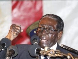 Zimbabwean President Robert Mugabe addresses a gathering at a stadium in the town of Bindura in northern Zimbabwe, July 8, 2016. In his first public appearance after a massive strike over economic deterioration, Mugabe explained to his supporters that the situation was exacerbated by a lasting drought and sanctions of the West. (Xinhua)