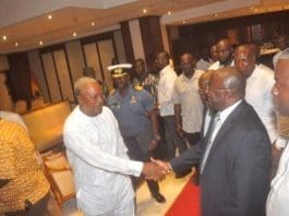 President Mahama (Second from left) and Nana Akufo-Addo (Third from right) in a handshake at the inauguration of the Joint Transition Team in Accra.