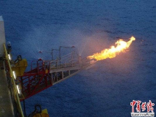 A flame emerges on the Blue Whale 1 drilling platform in the Shenhu area of the South China Sea, marking China’s successful exploitation of natural gas from the natural gas hydrate at the seabed 1,266 meters under the sea. (Photo by China Youth Online)