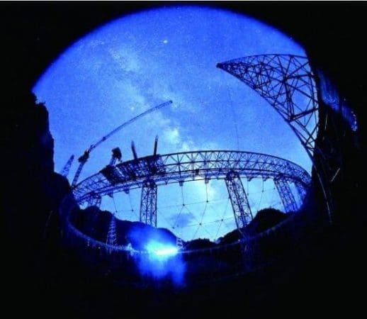 The FAST under construction. (Photo by government website of the Qiannan Buyi and Miao Autonomous Prefecture, Guizhou Province)