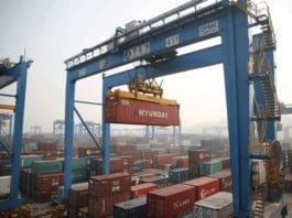 Photo taken on January 17, 2018 shows the busy automated container terminal at Port of Qingdao in east China’s Shandong province. (Photo by Zhang Jingang from People’s Daily Online)