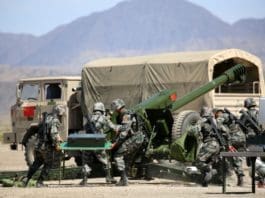 People's Liberation Army (PLA) soldiers and officers compete in a contest of artillery reparation during the International Army Games 2017, August 3, 2017. (Photo from People’s Daily Online)