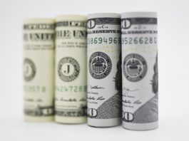 Photo taken on Sept. 18, 2019 shows U.S. dollar banknotes in Washington D.C., the United States. U.S. Federal Reserve on Wednesday lowered interest rates by 25 basis points amid growing risks and uncertainties stemming from trade tensions and a global economic slowdown, following a rate cut in July that was its first in more a decade. (Xinhua/Liu Jie)