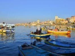 Palestinian fishermen go fishing on their boat at a seaport in Gaza, Feb. 5, 2020. The Israeli army decided on Wednesday to reduce the allowed fishing zone off the Gaza Strip coast from 15 to 10 nautical miles, said Israeli and Palestinian sources. (Photo by Rizek Abdeljawad/Xinhua)