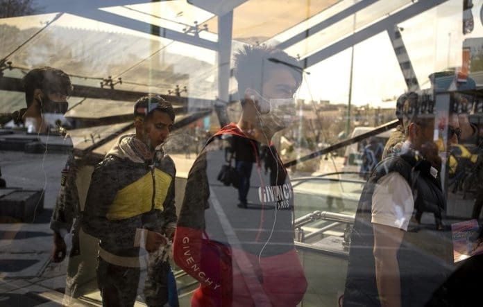 Pedestrians wearing masks are seen in downtown Tehran, Iran, Feb. 23, 2020. Iranian President Hassan Rouhani on Sunday issued an order to form a national headquarters to cope with the outbreak of the novel coronavirus in the country, state TV reported. Since Iran announced the first batch cases of the coronavirus in the country on Wednesday, 43 Iranians have been confirmed infected by the virus, eight of whom have died. (Photo by Ahmad Halabisaz/Xinhua)