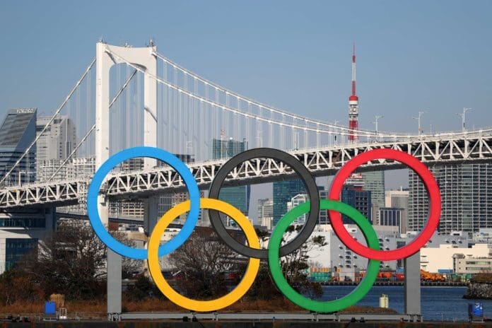 The Olympic rings are seen in front of Tokyo’s iconic Rainbow Bridge and Tokyo Tower at Odaiba Marine Park on January 20, 2020 in Tokyo, Japan. (Photo by Clive Rose/Getty Images)