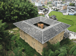 One of John Lin’s Tulou renovation, with a wooden tower staircase installed inside the building. Photo courtesy of Faculty of Architecture, Hong Kong University