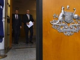 Australian Prime Minister Scott Morrison (R) and Australian Treasurer Josh Frydenberg (L) arrive to speak to the media prior to a press conference at Parliament House in Canberra, Australia, 12 March 2020. Morrison announced an economic stimulus package, worth 17.6 billion Australian dollar (around 11.4 billion US dollar) for the fiscal year, to keep the Australian economy from entering into a recession due to the coronavirus epidemic. EPA/LUKAS COCH AUSTRALIA AND NEW ZEALAND OUT