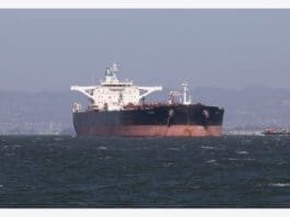 An oil tanker sits offshore in the San Francisco Bay Area, the United States, April 26, 2020. More than 30 oil tankers carrying over 20 million barrels of crude oil are parked between Long Beach and the San Francisco Bay Area. (Photo by Li Jianguo/Xinhua)