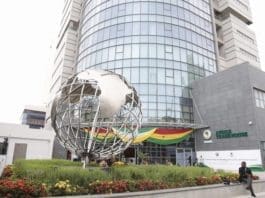 A man sits outside the African Continental Free Trade Area (AfCFTA) Secretariat office in Accra, capital of Ghana, August 17, 2020. Ghanaian President on Monday handed over the edifice housing the African Continental Free Trade Area (AfCFTA) secretariat to the African Union (AU) for the commencement of work. (Ghana Presidency/Handout via Xinhua)