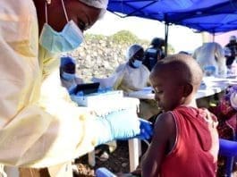 A Congolese health worker administers ebola vaccine to a child at the Himbi Health Centre in Goma, Democratic Republic of Congo, July 17, 2019. Olivia Acland | Reuters