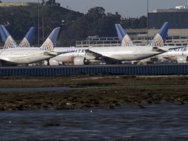United Airlines planes sit on the tarmac at the San Francisco International Airport (SFO) in San Francisco, California, USA, 22 February 2021. Federal regulators and United Airlines recently announced they will be grounding 24 Boeing 777 aircraft powered by Pratt & Whitney 4000 series engines, the same engine used in the United Flight 328, tail number N772UA incident that experienced a right engine failure that scattered parts over a neighborhood in Colorado bound for Honolulu, Hawaii and made an emergency on its return to Denver International Airport. EPA/JOHN G. MABANGLO