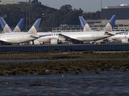 United Airlines planes sit on the tarmac at the San Francisco International Airport (SFO) in San Francisco, California, USA, 22 February 2021. Federal regulators and United Airlines recently announced they will be grounding 24 Boeing 777 aircraft powered by Pratt & Whitney 4000 series engines, the same engine used in the United Flight 328, tail number N772UA incident that experienced a right engine failure that scattered parts over a neighborhood in Colorado bound for Honolulu, Hawaii and made an emergency on its return to Denver International Airport. EPA/JOHN G. MABANGLO