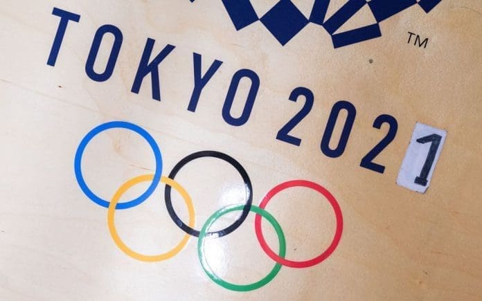 No fans at start of Olympic torch relay FILED - A sticker alters the Tokyo Games from 2020 to 2021 in the gym of German wrestler Frank Staebler. On Monday local organizers said the opening of the torch relay ahead of the Games would take place without spectators due to the coronavirus pandemic. Photo: Marijan Murat/dpa