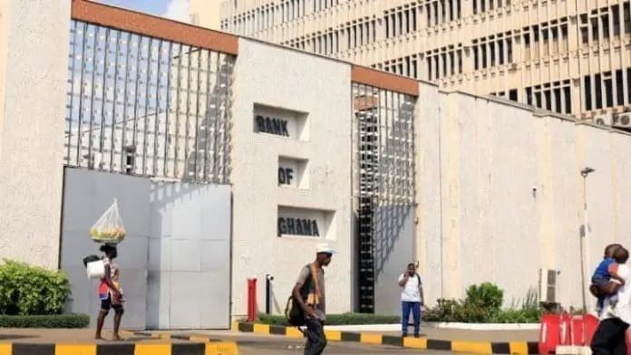 People walk past the Bank of Ghana in Accra, Ghana. Photo by: REUTERS / Zohra Bensemra
