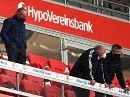 10 April 2021, Bavaria, Munich: (L-R) Karl-Heinz Rummenigge, Chairman of the Board of FC Bayern, Uli Hoeness, Honorary President of FC Bayern, and Herbert Hainer, President of FC Bayern, stand in the stands during the German Bundesliga soccer match between FC Bayern Munich and 1. FC Union Berlin at Allianz Arena. Photo: Sven Hoppe/dpa - IMPORTANT NOTICE: DFL and DFB regulations prohibit any use of photographs as image sequences and/or quasi-video.