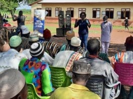 a cross section of participants Kpatinga, Dr Owusu-Amankwah (in front) explaining the issues to the participants at Nasande
