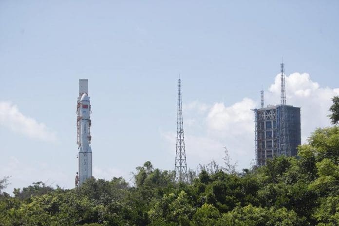 The combination of the Tianzhou-2 cargo spacecraft and a Long March-7 carrier rocket is transferred to the launching area, May 16. (Photo/Xinhua)