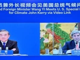 Chinese State Councilor and Foreign Minister Wang Yi meets with the U.S. Special Presidential Envoy for Climate John Kerry via video link, Sept. 1, 2021. (Xinhua/Yue Yuewei)