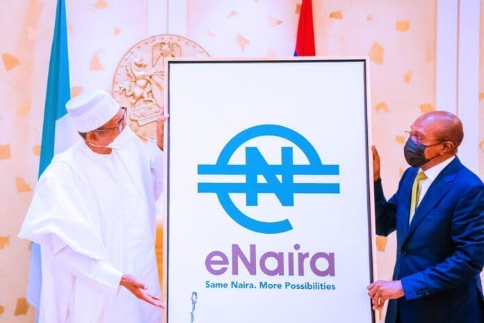 Nigerian President Muhammadu Buhari (L) attends the launch of eNaira at the Statehouse in Abuja, Nigeria, on Oct. 25, 2021. Buhari on Monday launched the eNaira, the country's central bank digital currency (CBDC). (Nigerian Presidency/Handout via Xinhua)