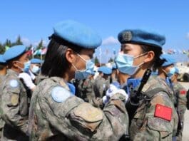 Soldiers on the Chinese contingent to the United Nations Interim Force in Lebanon (UNIFIL) are awarded the United Nations Peacekeeping Medal during a medal parade ceremony in southern Lebanon, June 16, 2021. (Photo by Liu Xiongma/Xinhua)