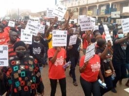 demonstrators presenting the petition