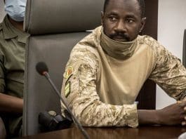 FILE - Col. Assimi Goita meets with a high-level delegation from the West African regional bloc known as ECOWAS, at the Ministry of Defense in Bamako, Mali on Aug. 22, 2020. Explosions and gunfire were heard Friday July 22, 2022 in the area of the Kati military base on the outskirts of Bamako, according to local residents, in a suspected attack by Islamic extremists. Goita frequently stays at the Kati camp, where he launched the 2020 coup that brought him to power. (AP Photo, File) The Associated Press