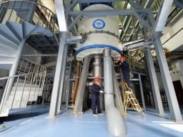 Scientific staff adjust the Steady High Magnetic Field Facility at the High Magnetic Field Laboratory, Chinese Academy of Sciences, Heifei, east China's Anhui province. (Photo by Xu Minhao/People's Daily Online)