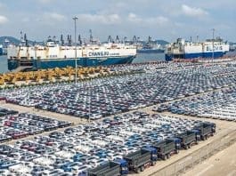 Vehicles are parked at a terminal in Yantai, east China's Shandong province, waiting to be shipped overseas, Sept. 3, 2022. (Photo by Zhang Chao/People's Daily Online)