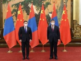 Chinese President Xi Jinping meets with Mongolian Prime Minister Luvsannamsrai Oyun-Erdene, who came to China for the Beijing 2022 Olympic Winter Games, at the Great Hall of the People in Beijing, capital of China, Feb. 6, 2022. (Photo by Ding Lin/Xinhua)
