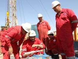Employees of Chinese oilfield services company Zhongman Petroleum and Natural Gas Group work at a drilling site of a deep-water well at Siwa Oasis, Egypt. (Photo by Zhou Zhou/People's Daily)