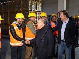 IOM’s Director General Antonio Vitorino and Regional Director for South-Eastern Europe, Eastern Europe and Central Asia Manfred Profazi, IOM Türkiye’s team at the warehouse, Gaziantep. Photo: Ever Mohammed IOM 2023
