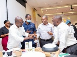 A Representative From Kissart Group Taking A Cross Section Of Audience Through The Use Of Some Assembled Ansell Lighting Products