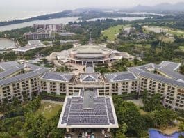 Solar panels are being installed at the Boao Asia Forum Hotel on Dongyu Island, Qionghai, south China's Hainan province, Feb. 26, 2023. (Photo by Meng Zhongde/People's Daily Online)