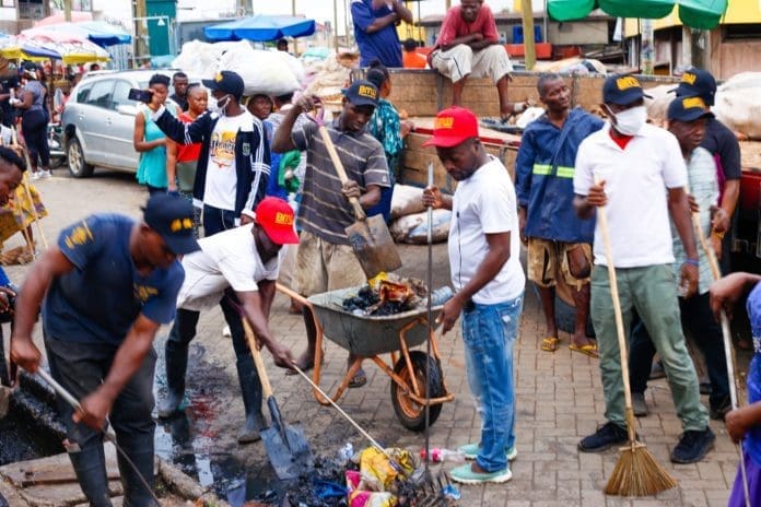 Members Of Bmw On Clean Up Exercise