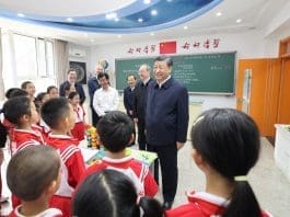 Chinese President Xi Jinping, also general secretary of the Communist Party of China Central Committee and chairman of the Central Military Commission, talks with students at a science classroom of Beijing Yuying School in Beijing, capital of China, May 31, 2023. (Xinhua/Wang Ye)