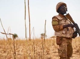 © Michele Cattani A soldier from Burkina Faso stands guard along the border with Mali and Niger during a military operation against terrorist suspects.