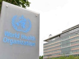 This photo taken on May 21, 2023 shows the logo of the World Health Organization (WHO) with the WHO headquarters in the background in Geneva, Switzerland. (Xinhua/Lian Yi)