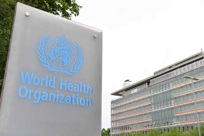 This photo taken on May 21, 2023 shows the logo of the World Health Organization (WHO) with the WHO headquarters in the background in Geneva, Switzerland. (Xinhua/Lian Yi)