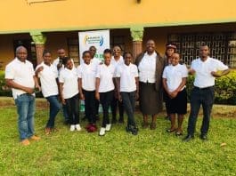 SOME youth Journalists: as African Youth Storytellers, posing for a photo with Lundazi District Commissioner, Marjory Banda after a digital media storytelling training at JohnEster Lodge in Lundazi, Eastern Region of Zambia