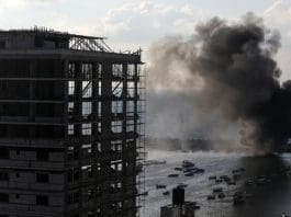 Gaza Building Hit By Idf With Smoke Billowing