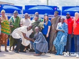 Seva community receives water storage containers