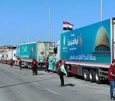 Trucks carrying aid from Egypt to Gaza