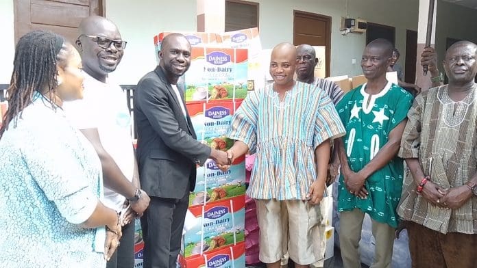 General Manager Of Dainess Foods Mr Frank Antwi Left And In Black Coat In A Handshake With The Manklalo Of Mepe Togbe Korsi Nego Vii During The Presentation General Manager Of Dainess Foods Mr Frank Antwi Left And In Black Coat In A Handshake With The Manklalo Of Mepe Togbe Korsi Nego Vii During The Presentation