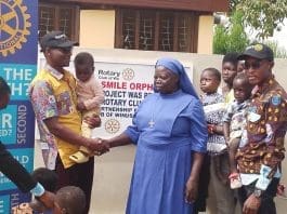 Mr Agambire Alhassan Inusah, President of the Rotary Club of Wa, handing over the facility to Reverend Sister Jane Mary Naalosegme